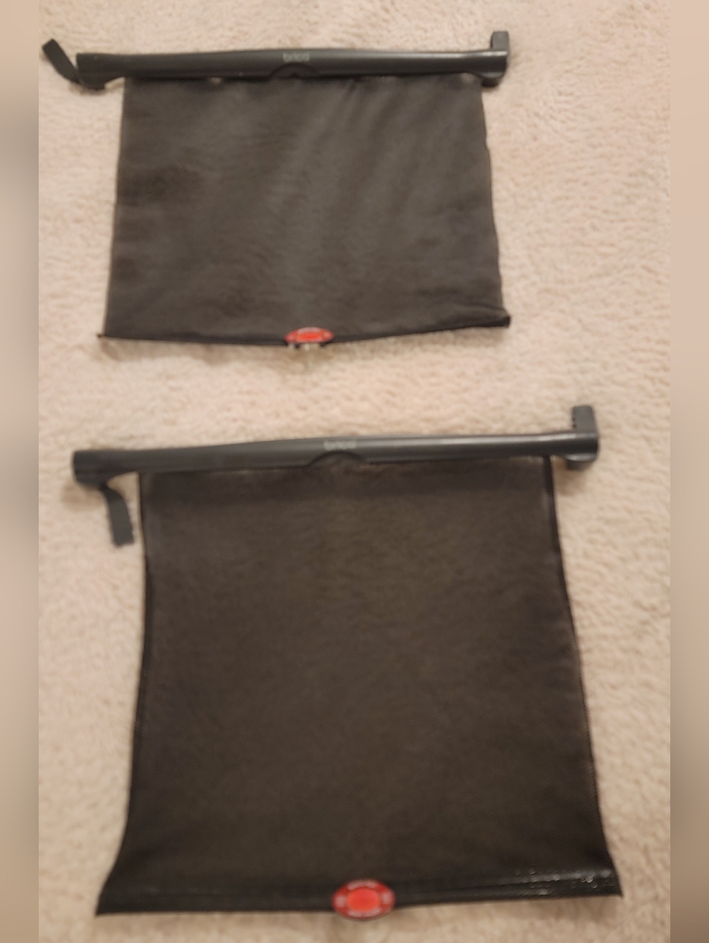 Brica roll-down window screens